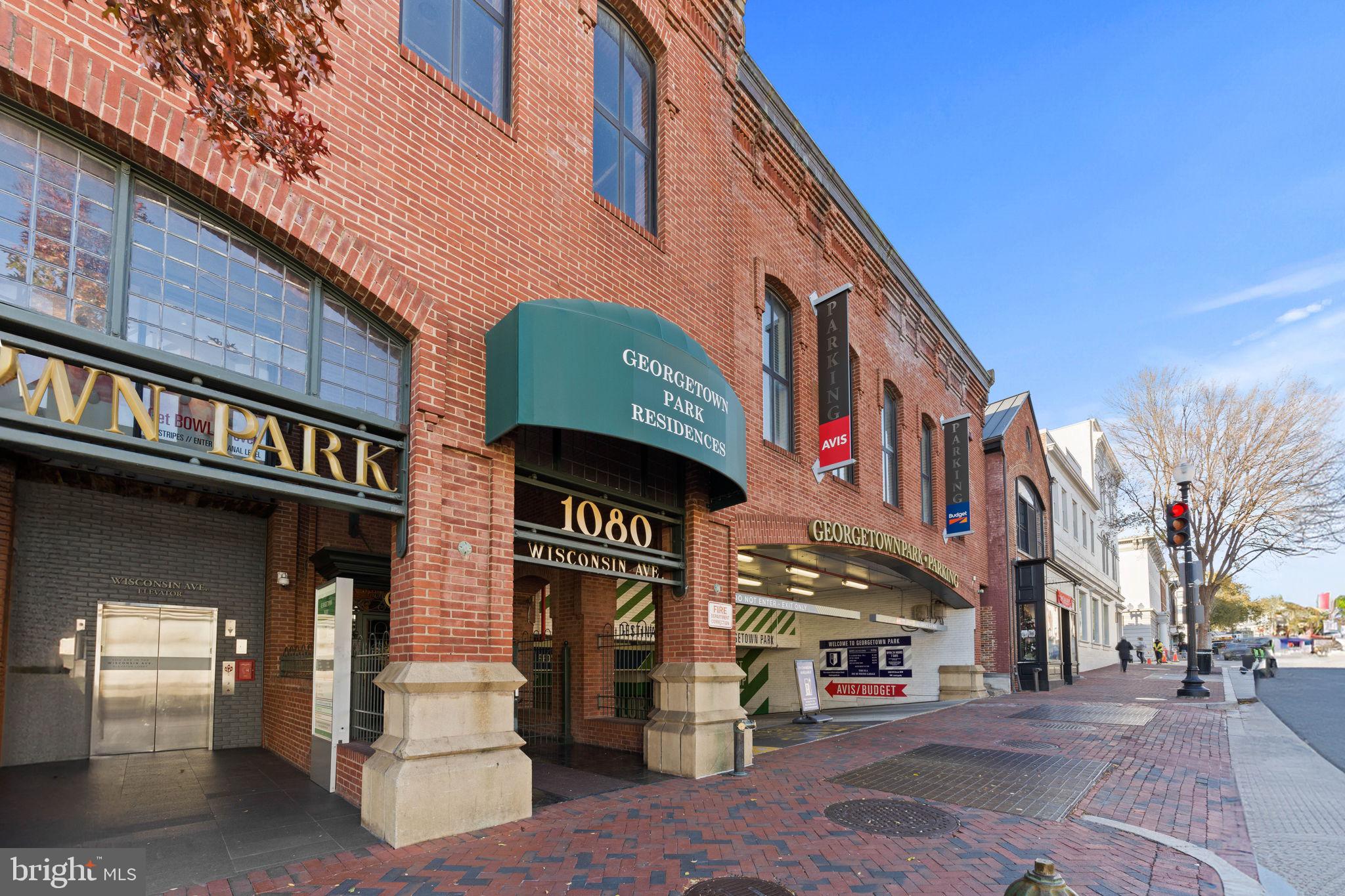 a front view of a building with street view