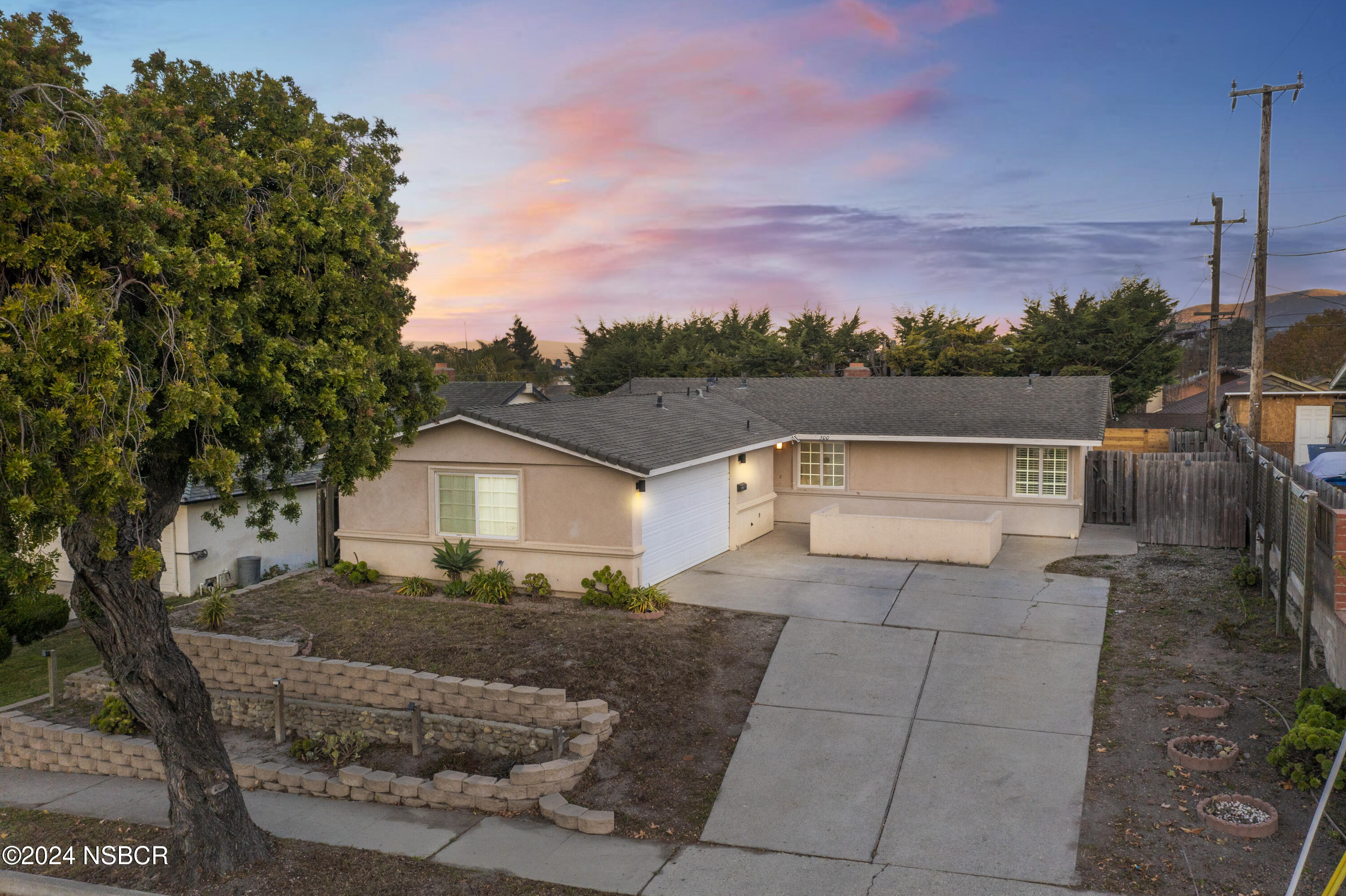 a view of house with outdoor space