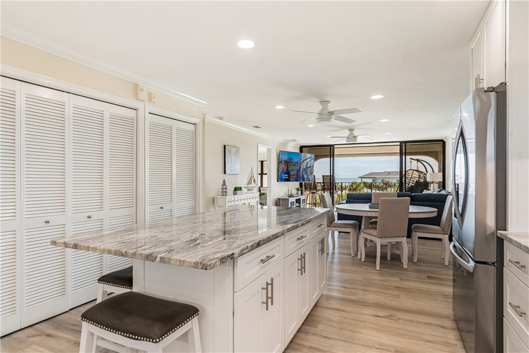 a kitchen with counter top space cabinets and sink