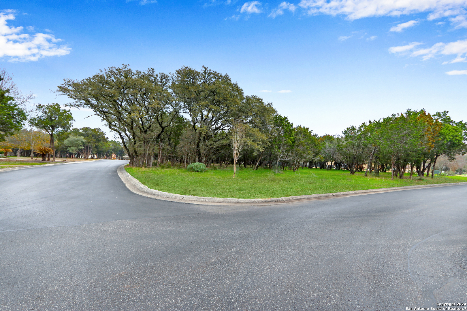 a view of a house with a big yard