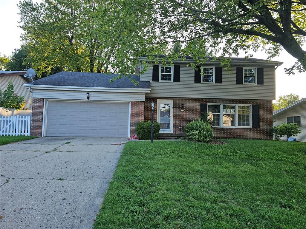 front view of house with a yard