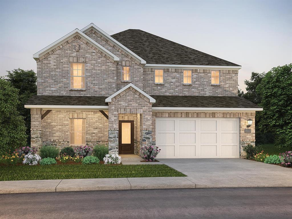 a front view of a house with a garden and garage