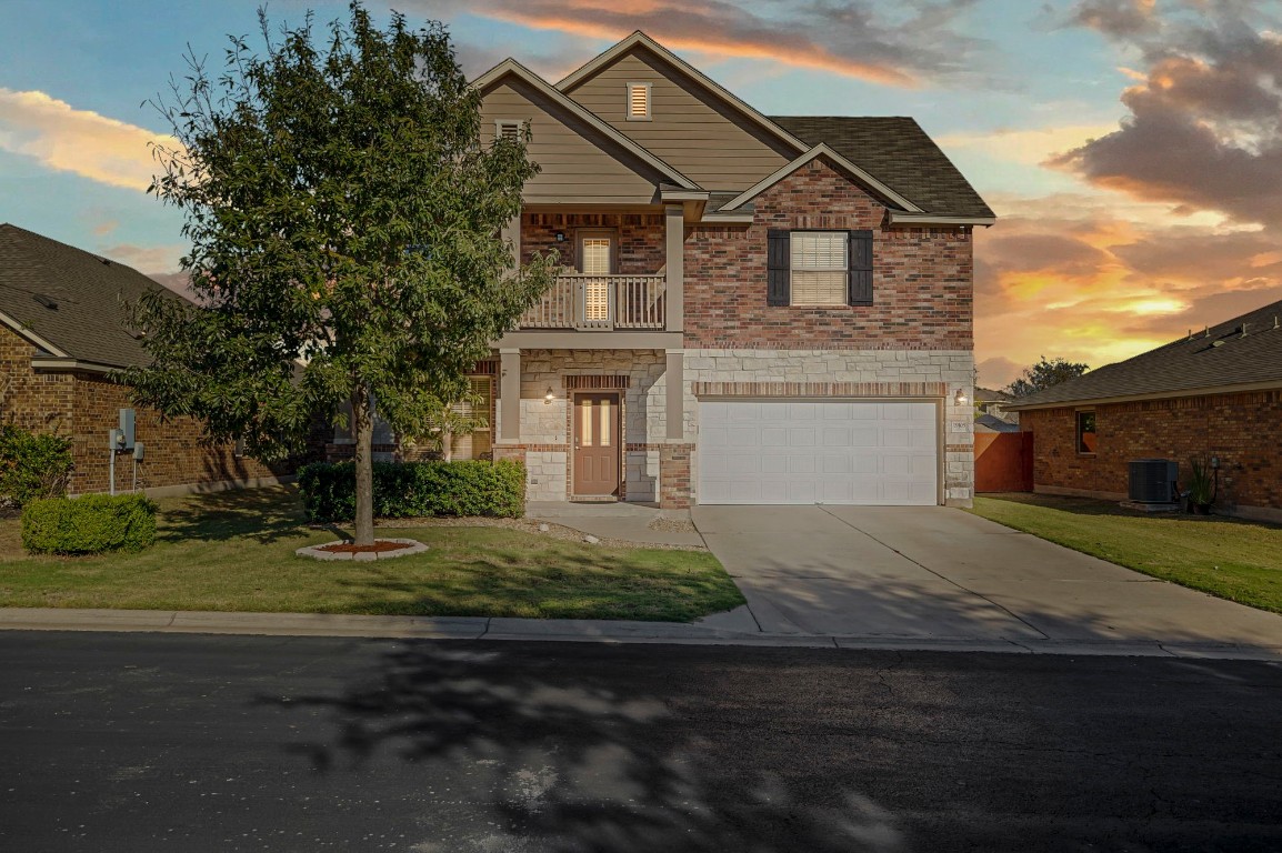 Welcome home! This stunning property has maximum curb appeal with an upgraded stone brick elevation, with a second level balcony, covered front porch, and covered back patio for outdoor + indoor enjoyment!