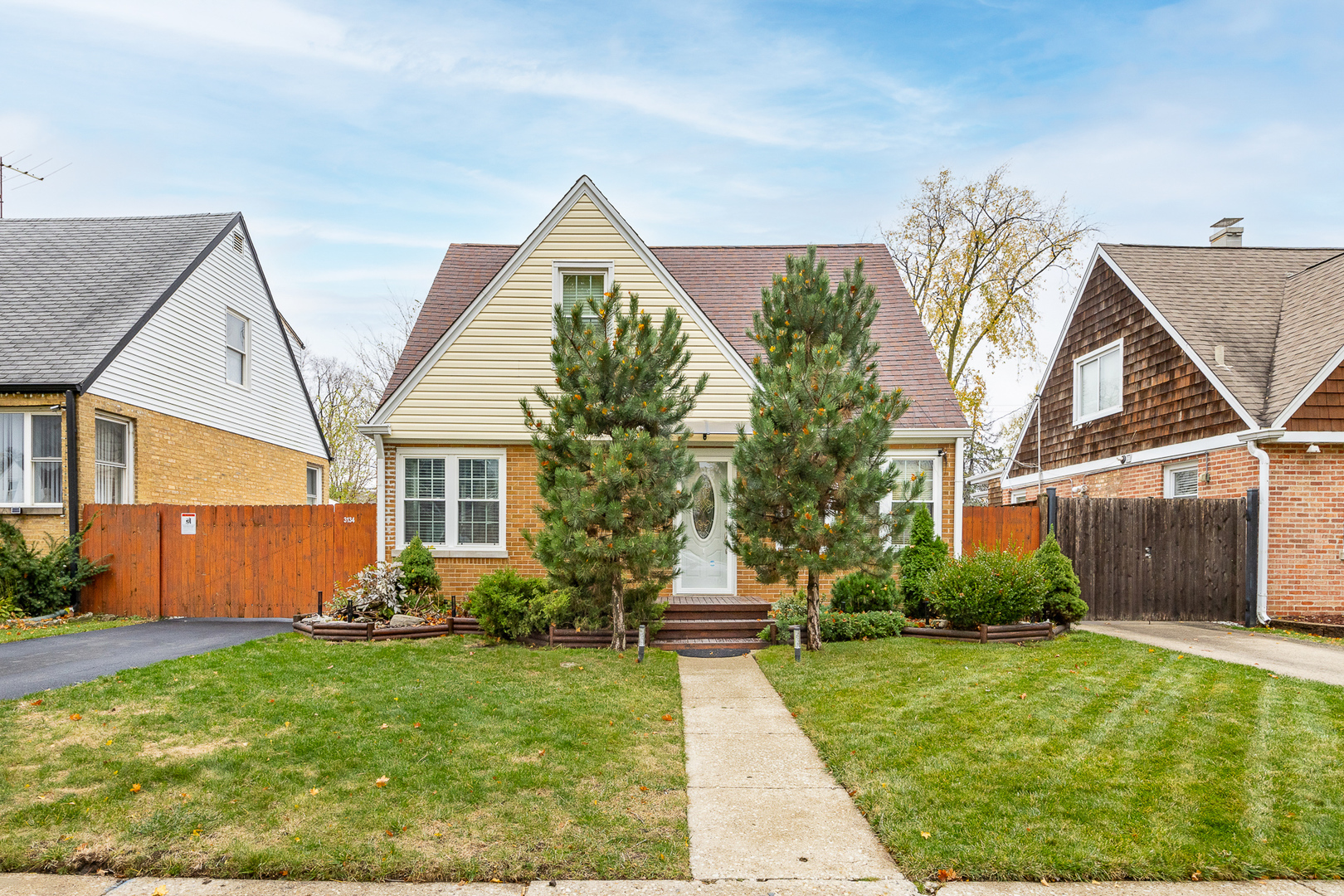 front view of a house with a yard