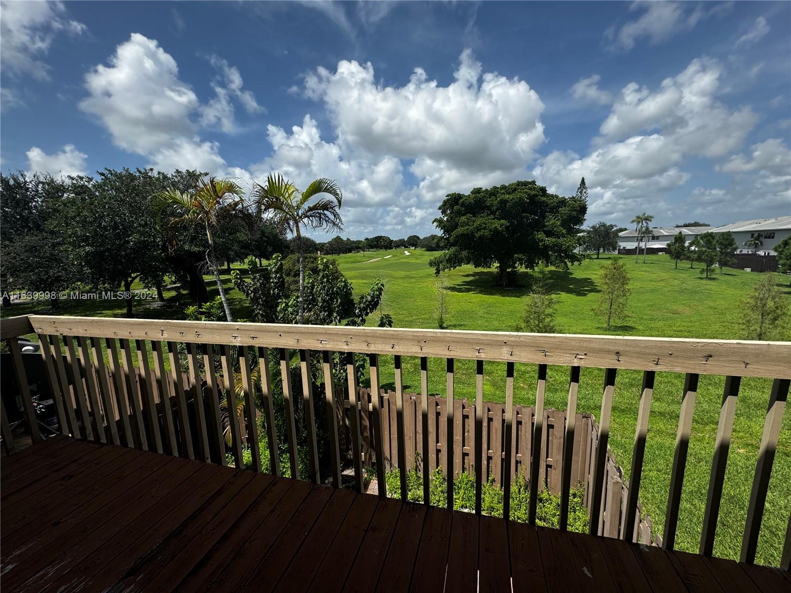 a view of a wooden roof deck