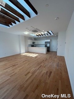 a big room with wooden floor