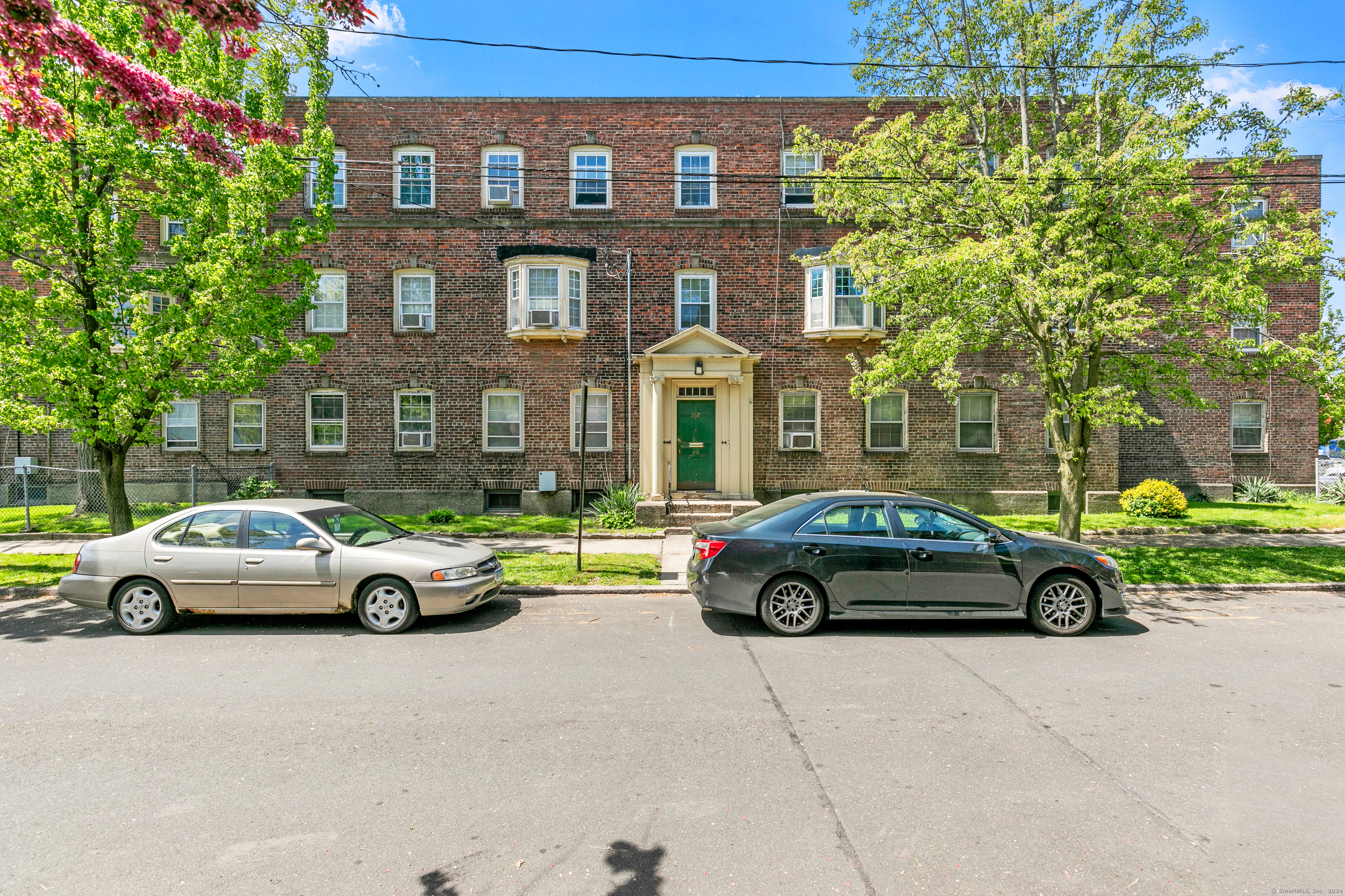 a car parked in front of a building