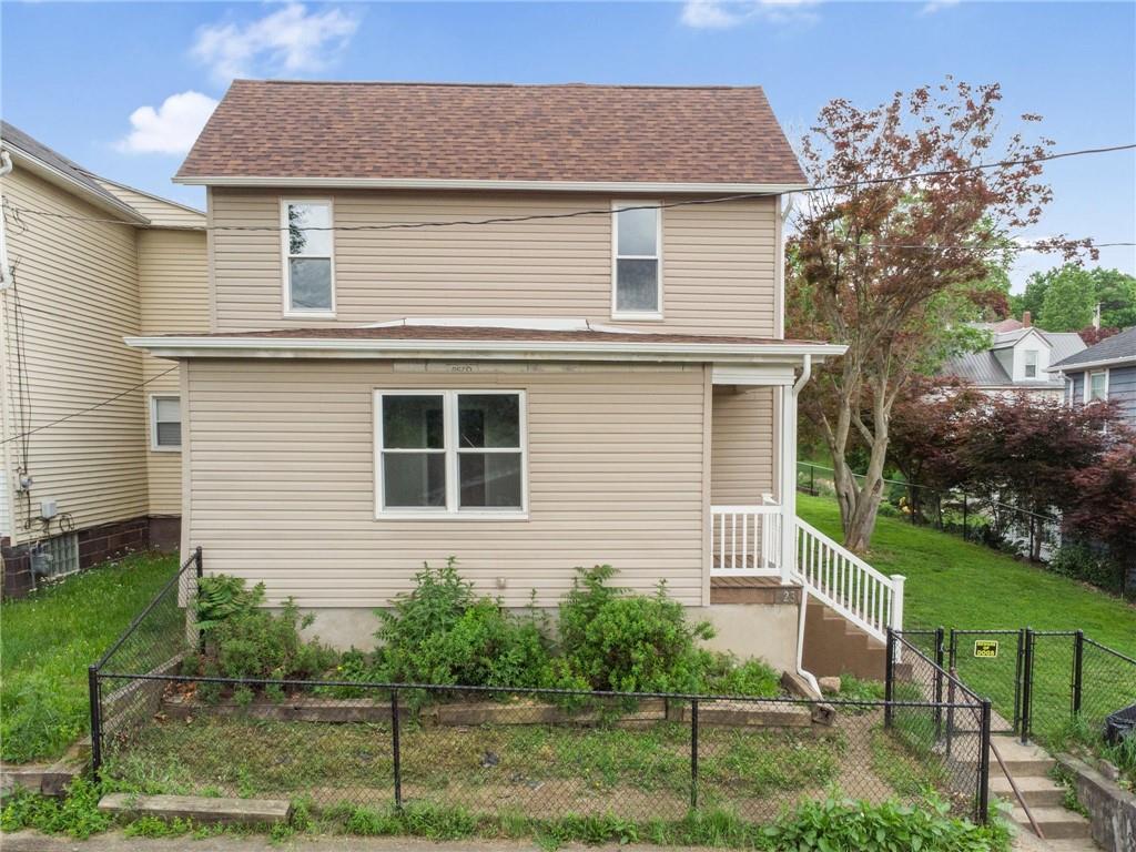 a view of backyard of house