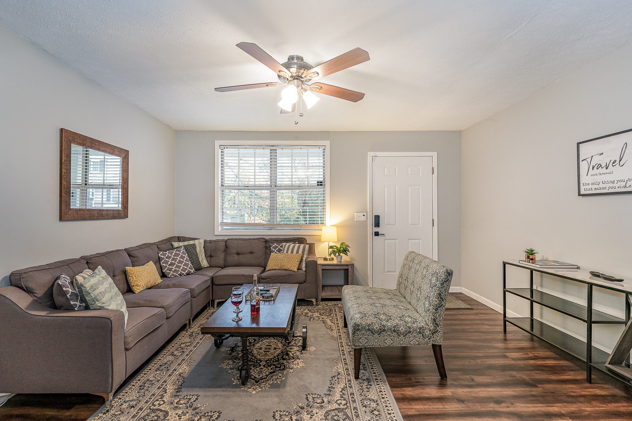 a living room with furniture and a window