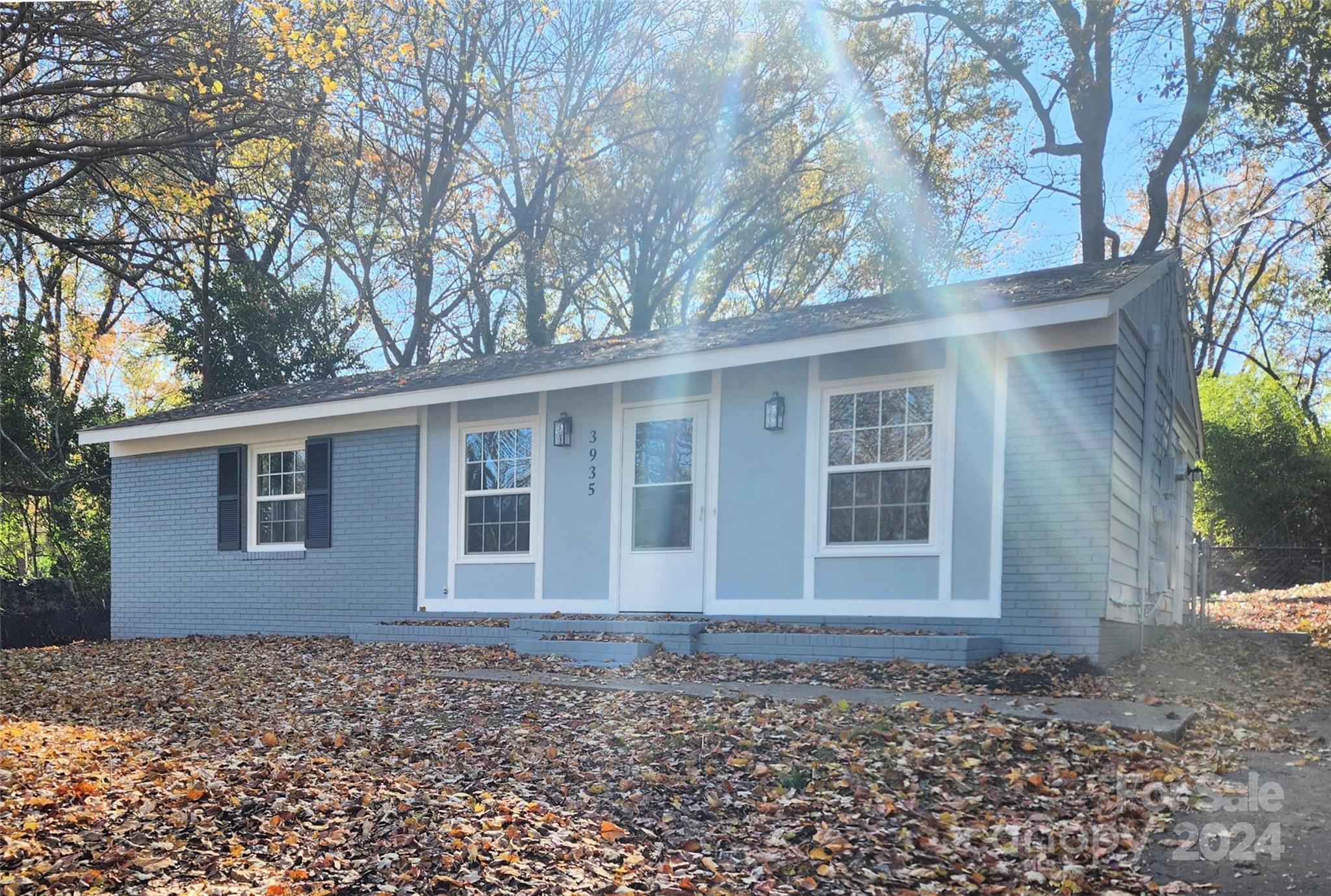 front view of a house with a yard