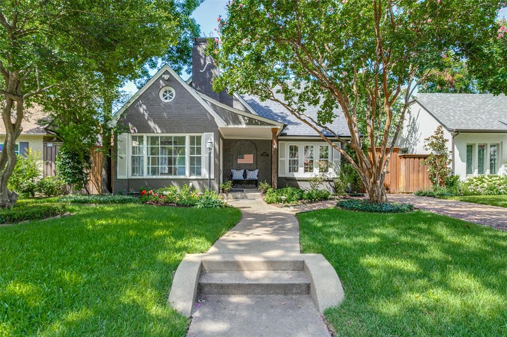 front view of a house and a yard