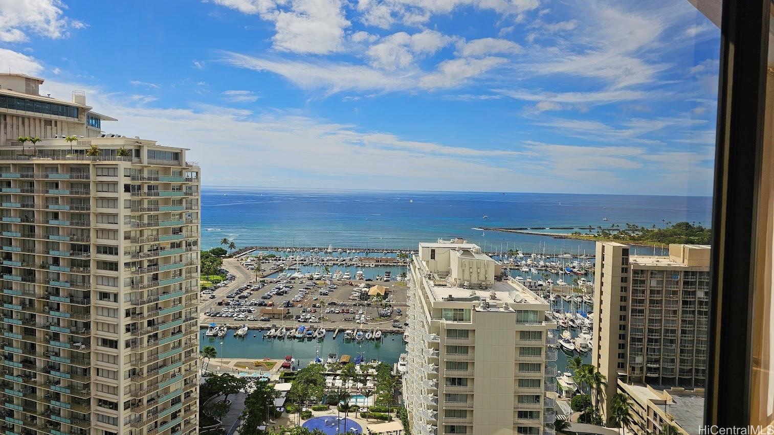 a view of a city with tall buildings