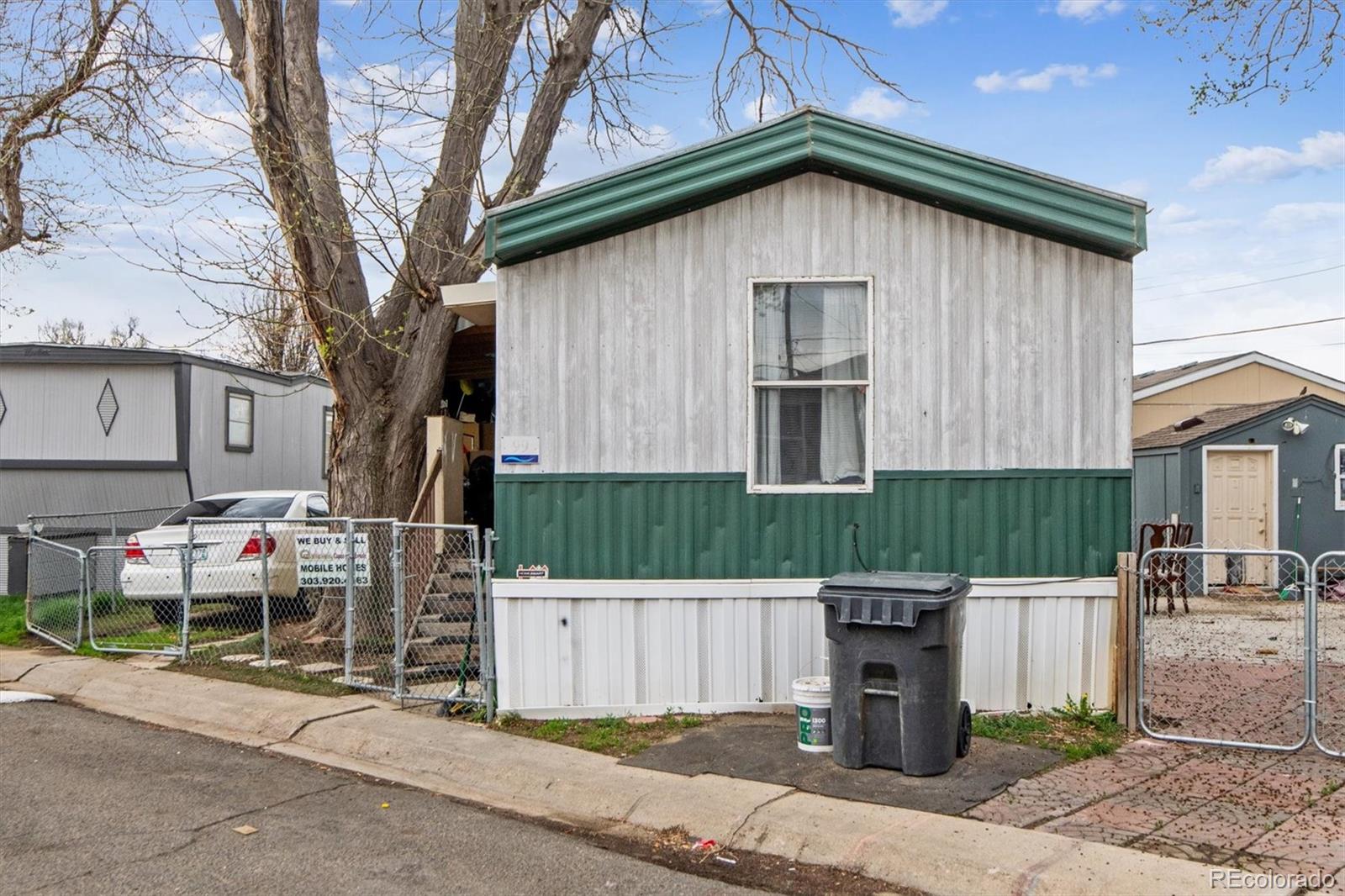 a front view of a house with garage