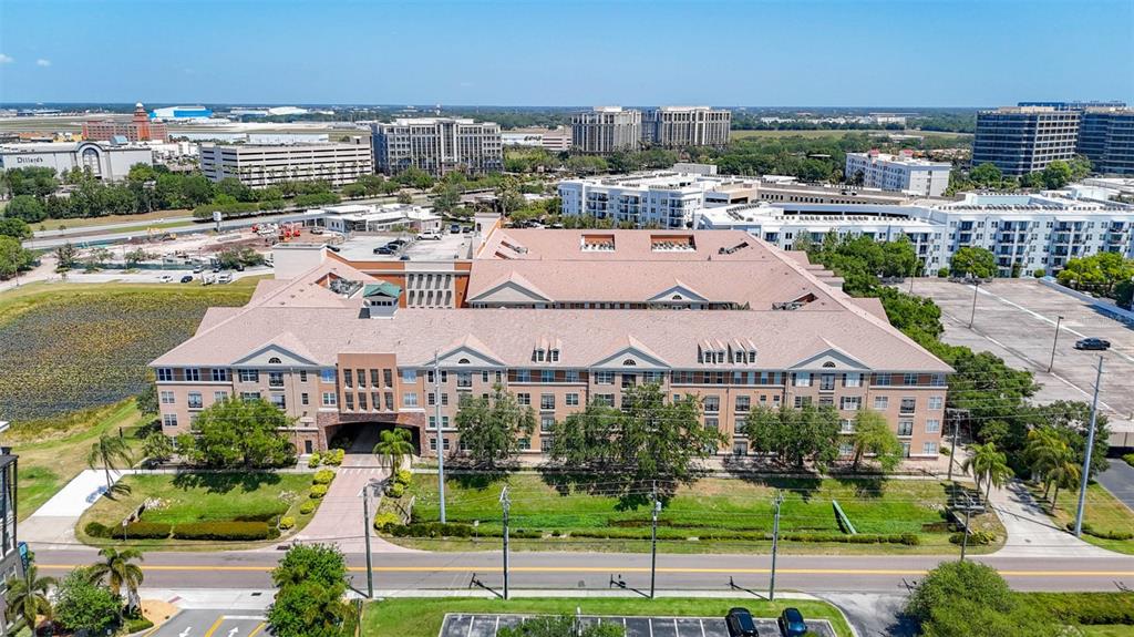 an aerial view of residential houses and outdoor space