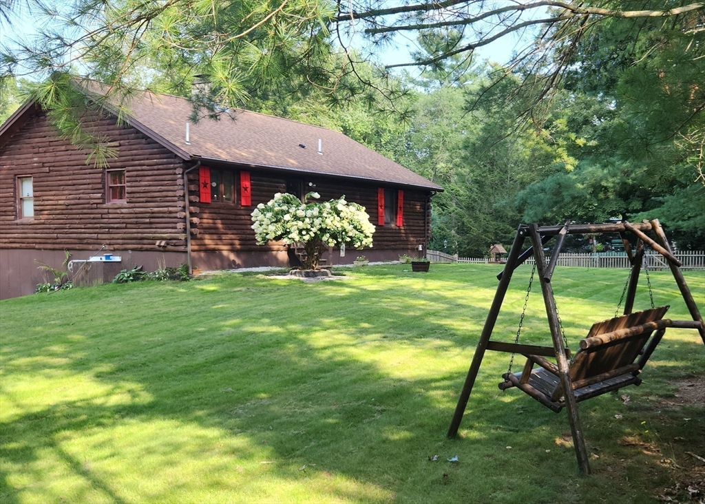 a view of a backyard with a garden