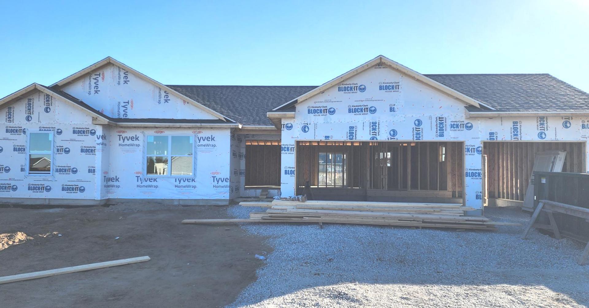 a front view of a house with a garage