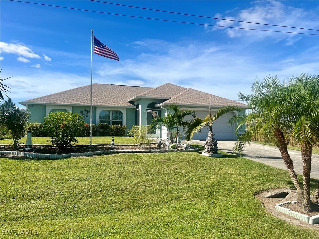 a view of a house with a yard porch and sitting area