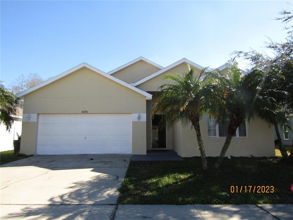 a front view of house with yard