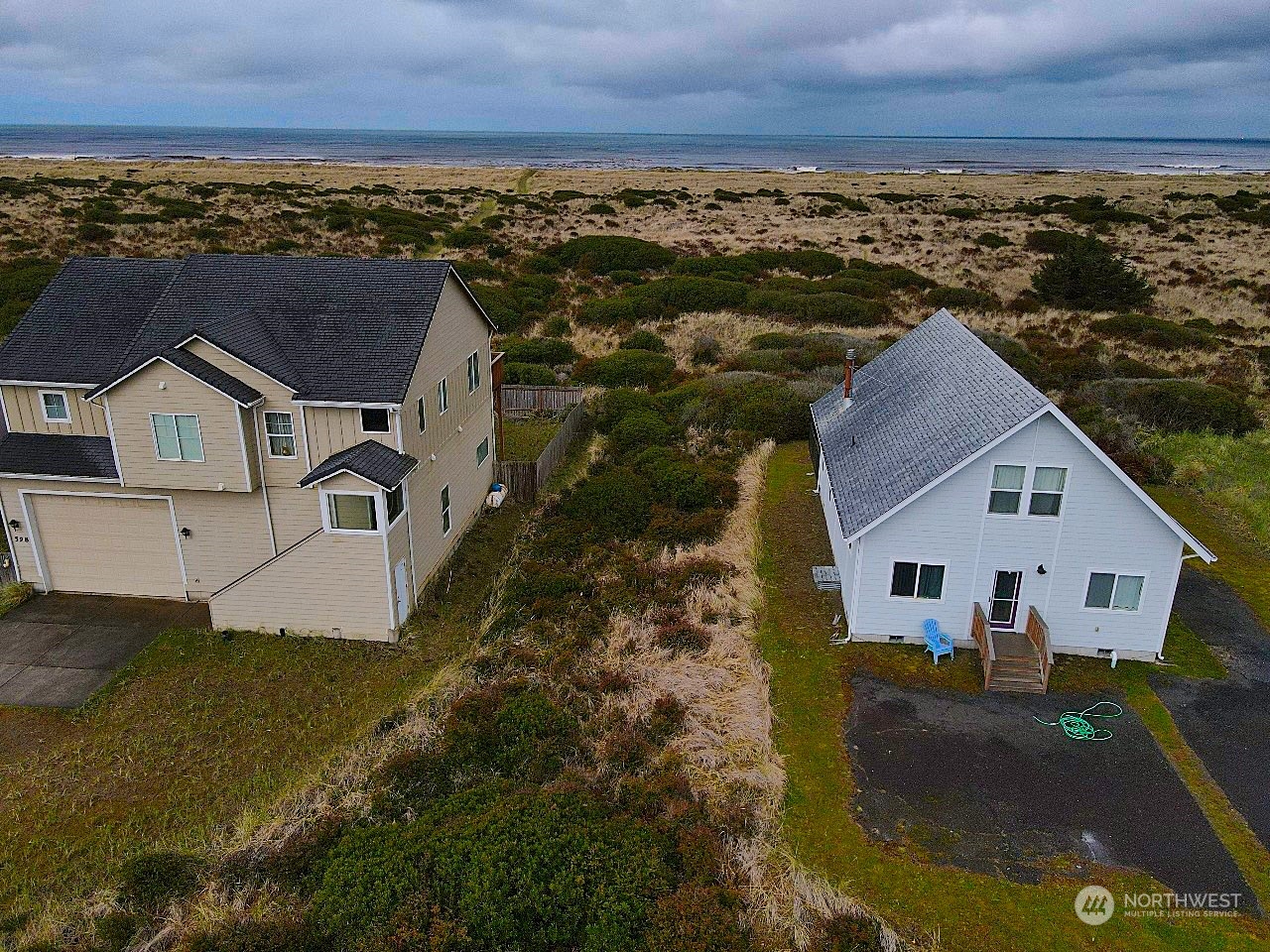 an aerial view of house with yard