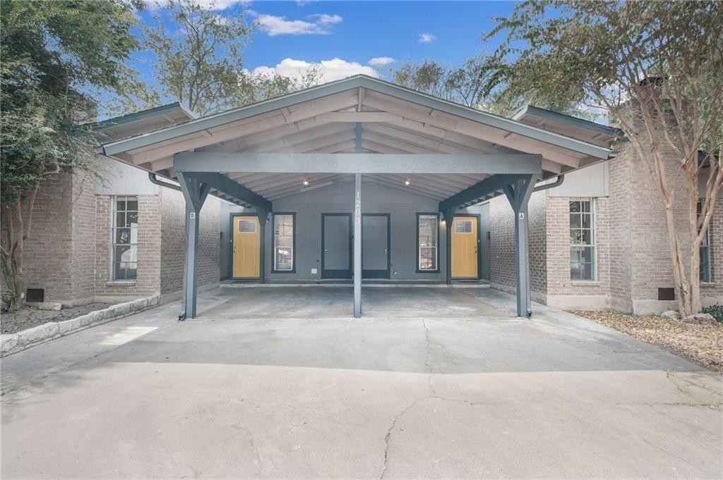 a view of a house with a garage