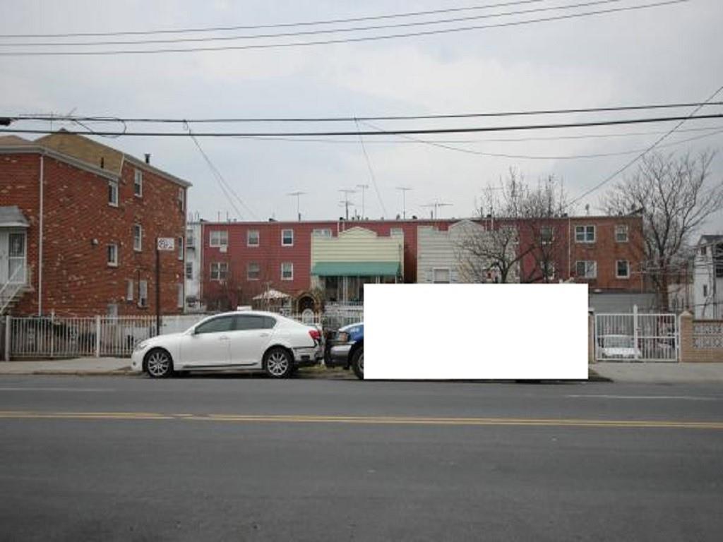 a view of street with parked cars