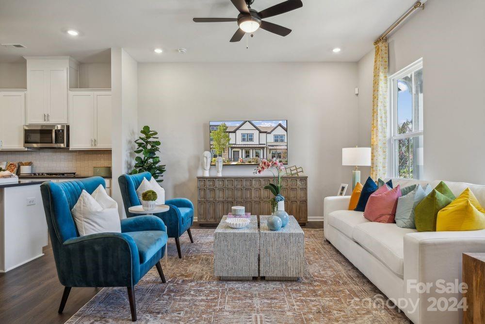 a living room with furniture and a couch