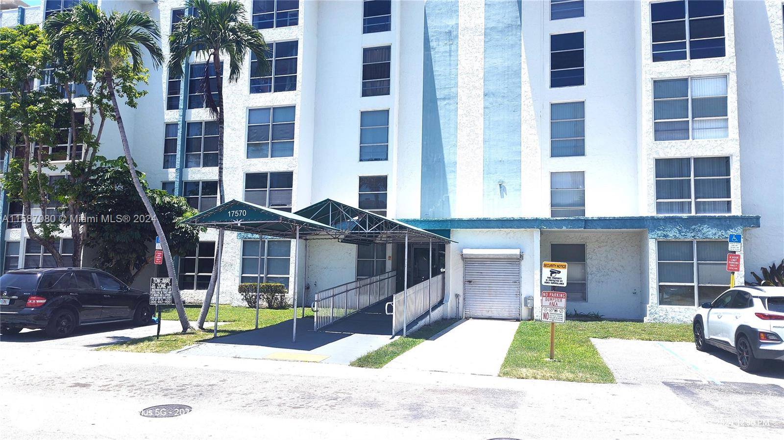 a view of a building with a street