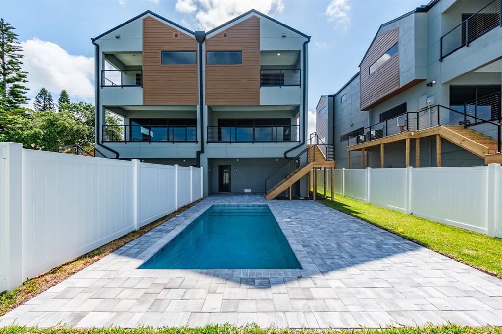 a view of a house with a swimming pool