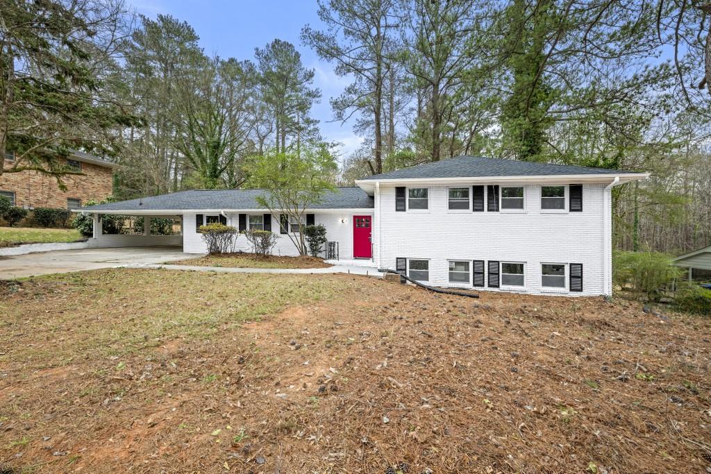 front view of a house with a yard