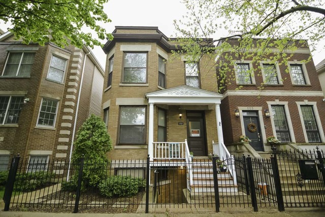 a front view of a multi story residential apartment building