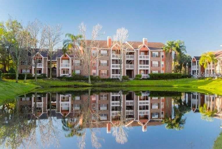 a view of a lake with a house