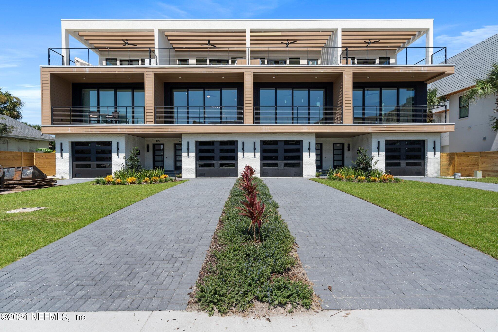 front view of a building with a yard