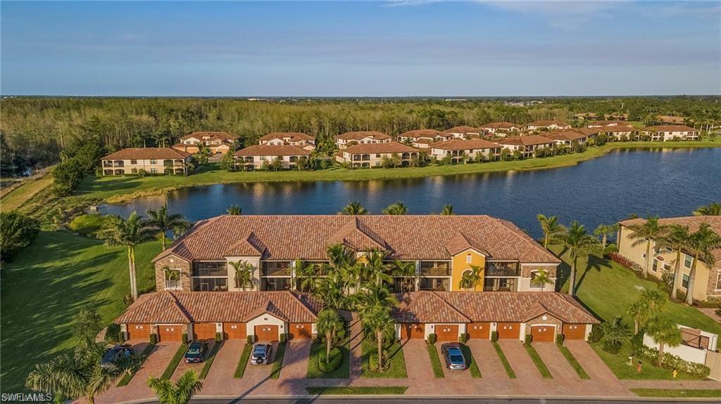 aerial view of a house with a lake view