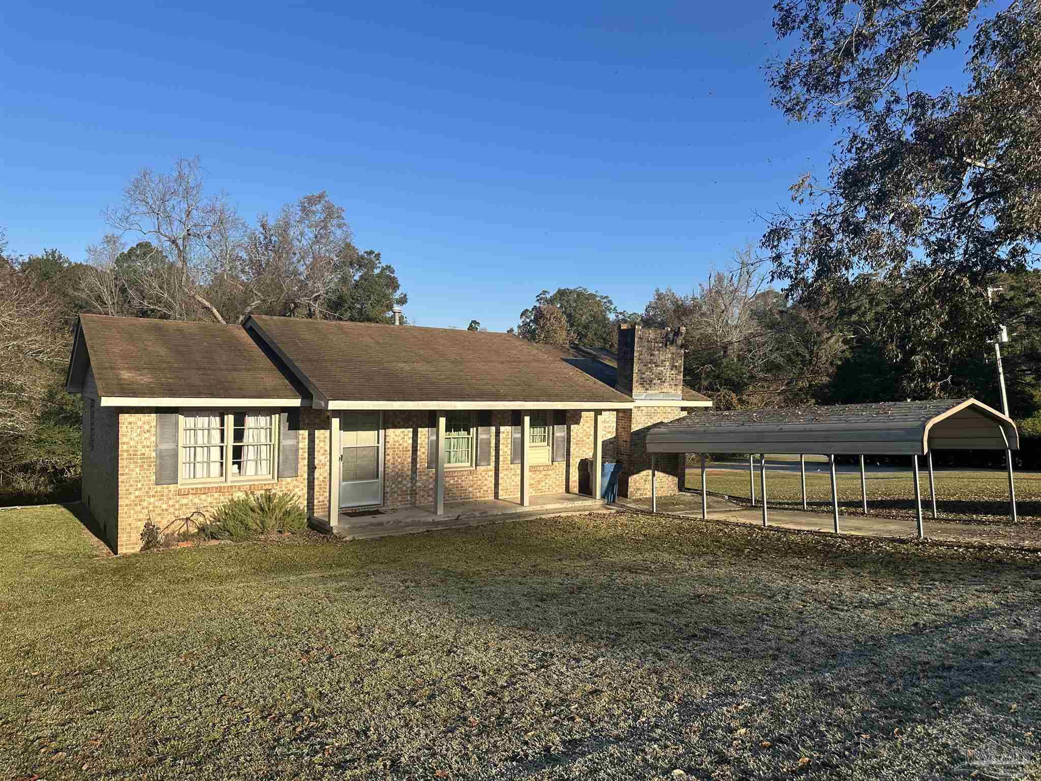 front view of a house with a yard