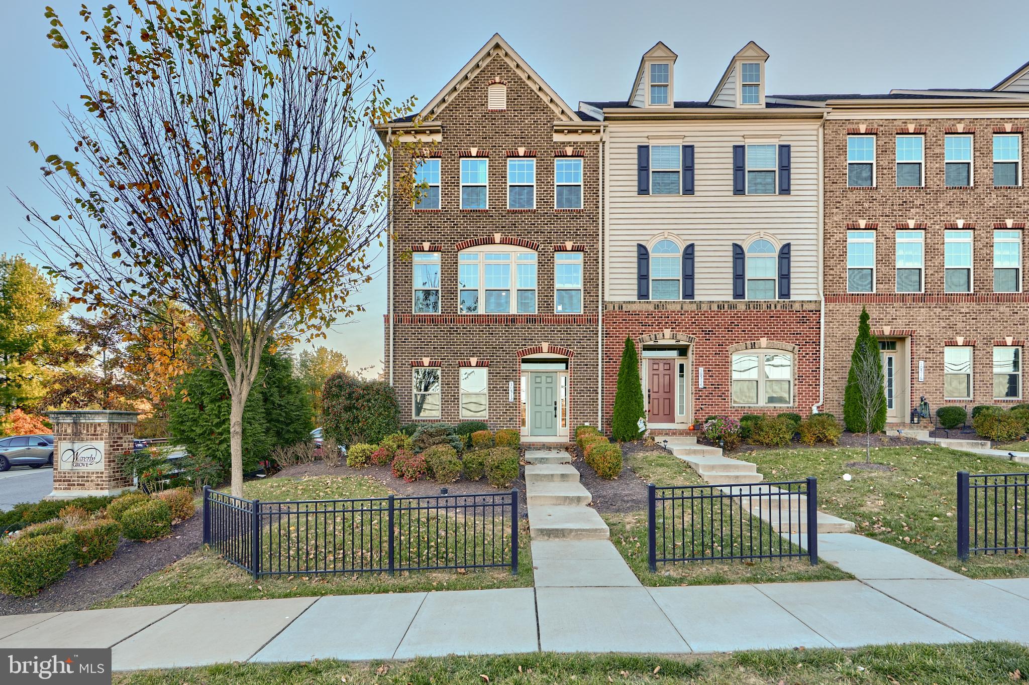 a front view of a building with garden