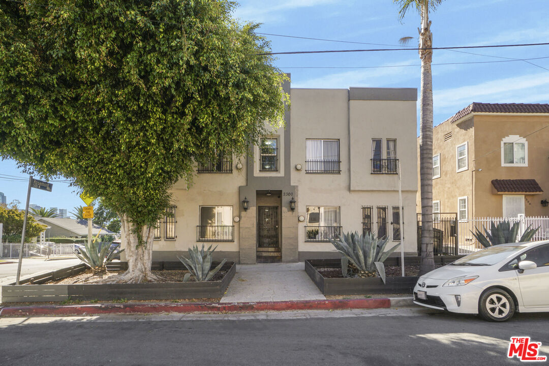 a car parked in front of a house