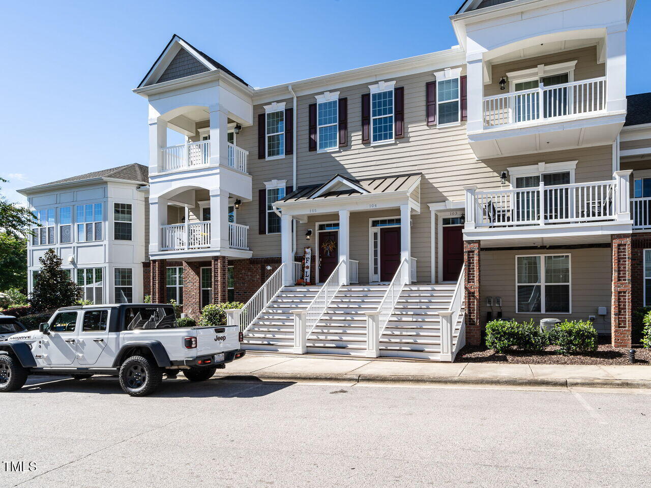 a car parked in front of a house