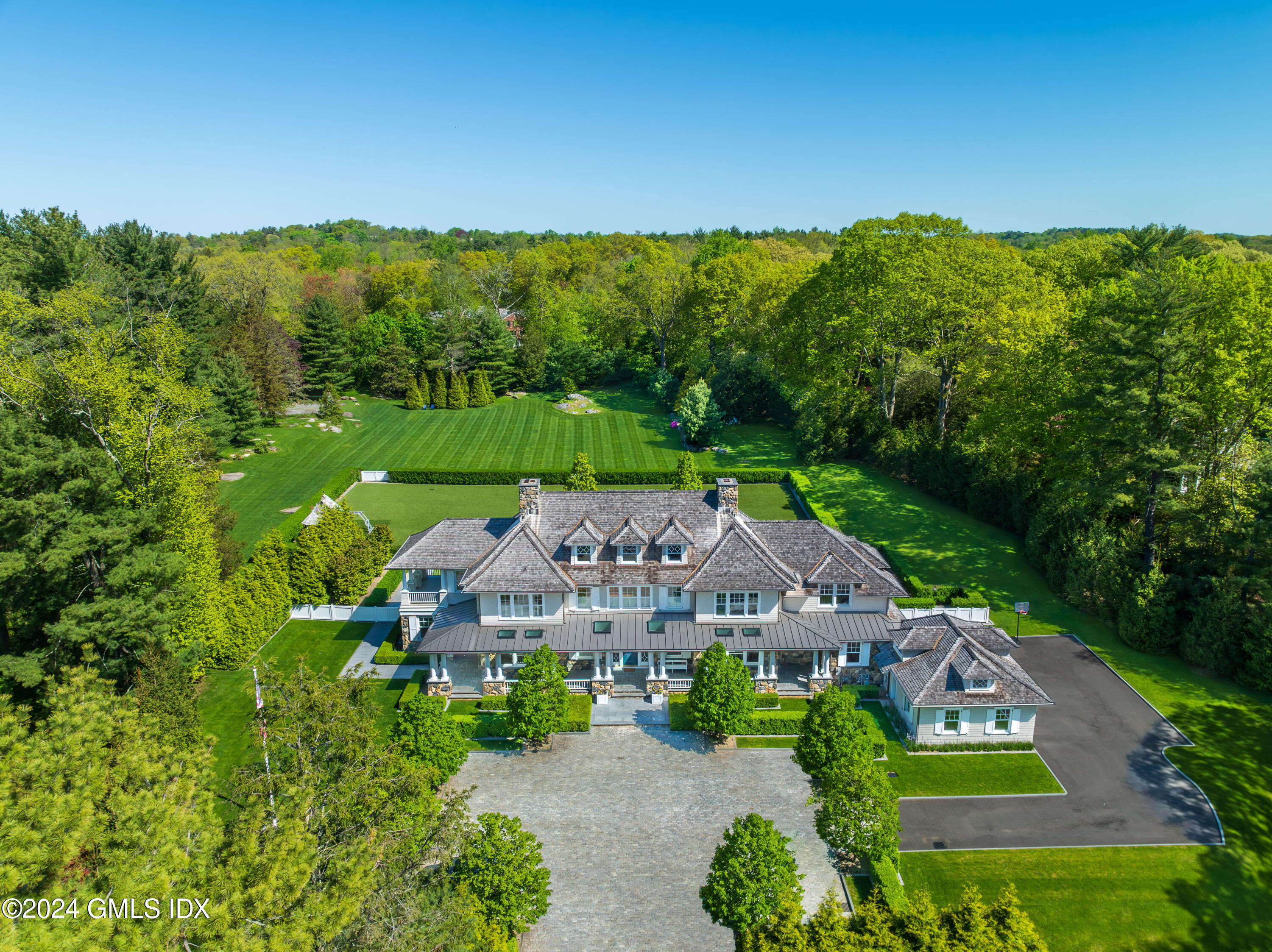 an aerial view of a house with garden