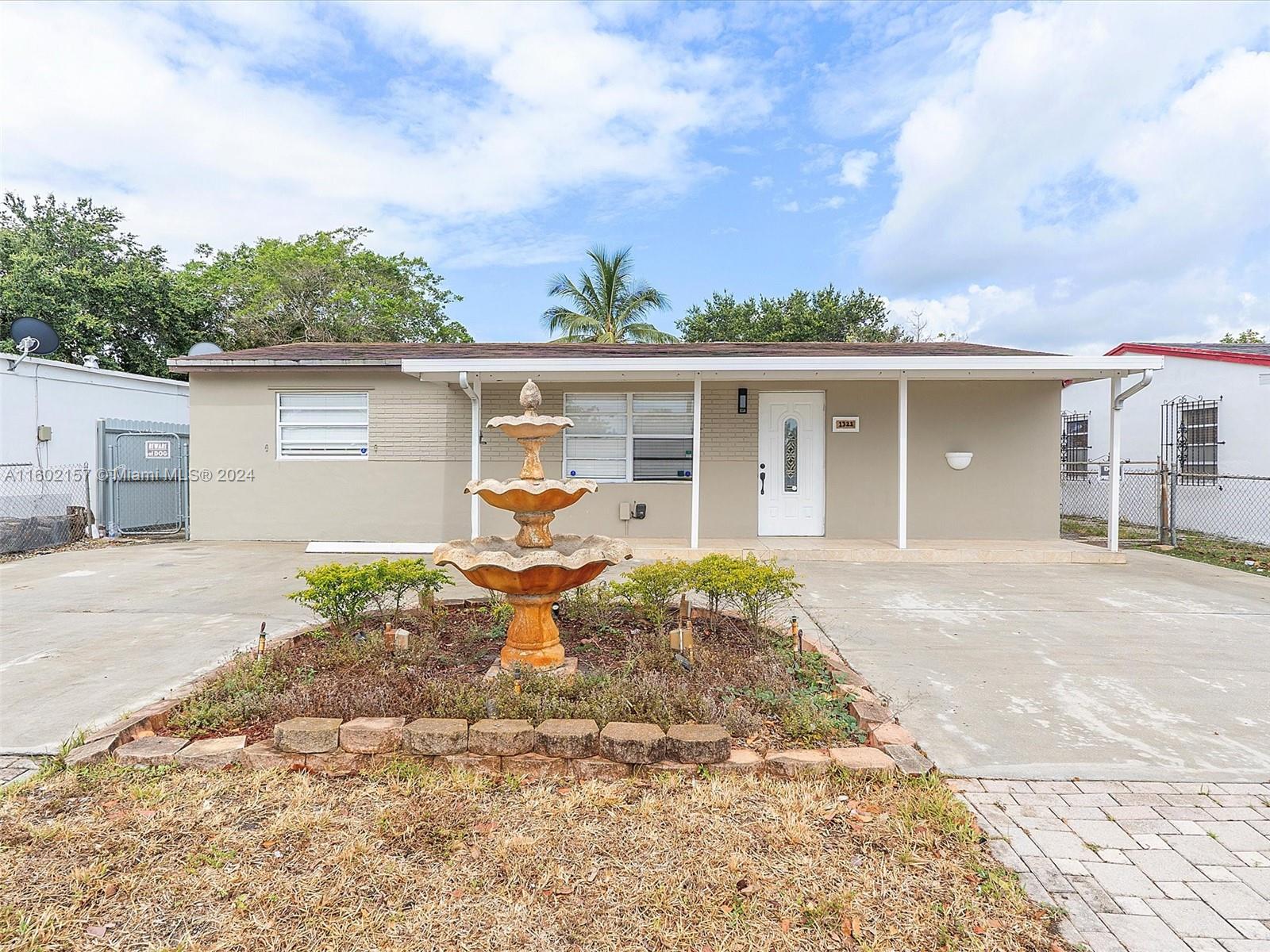 front view of a house with a patio