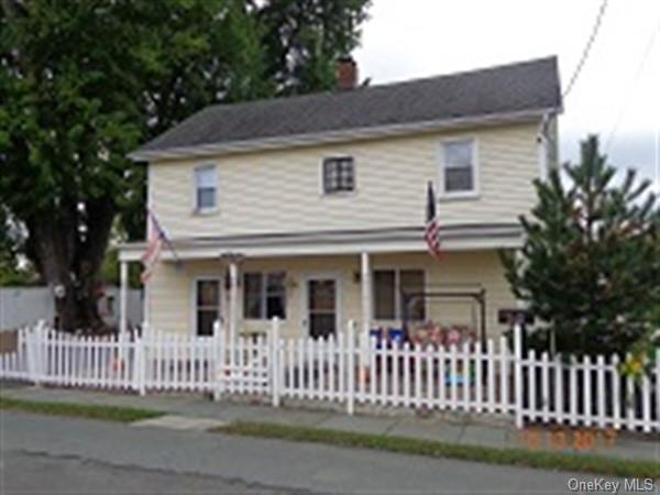 View of front of property featuring a porch