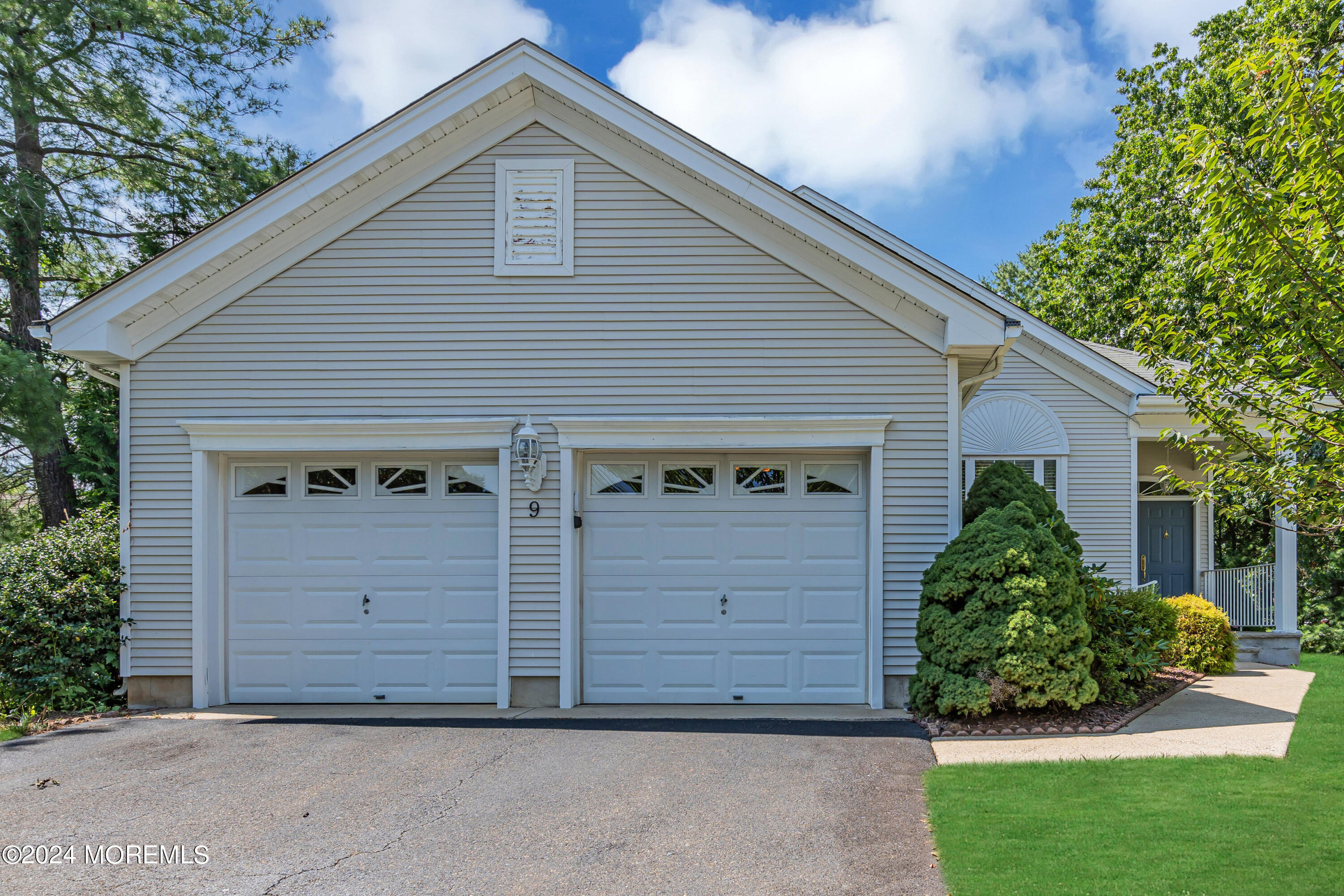 a view of a house with a garage