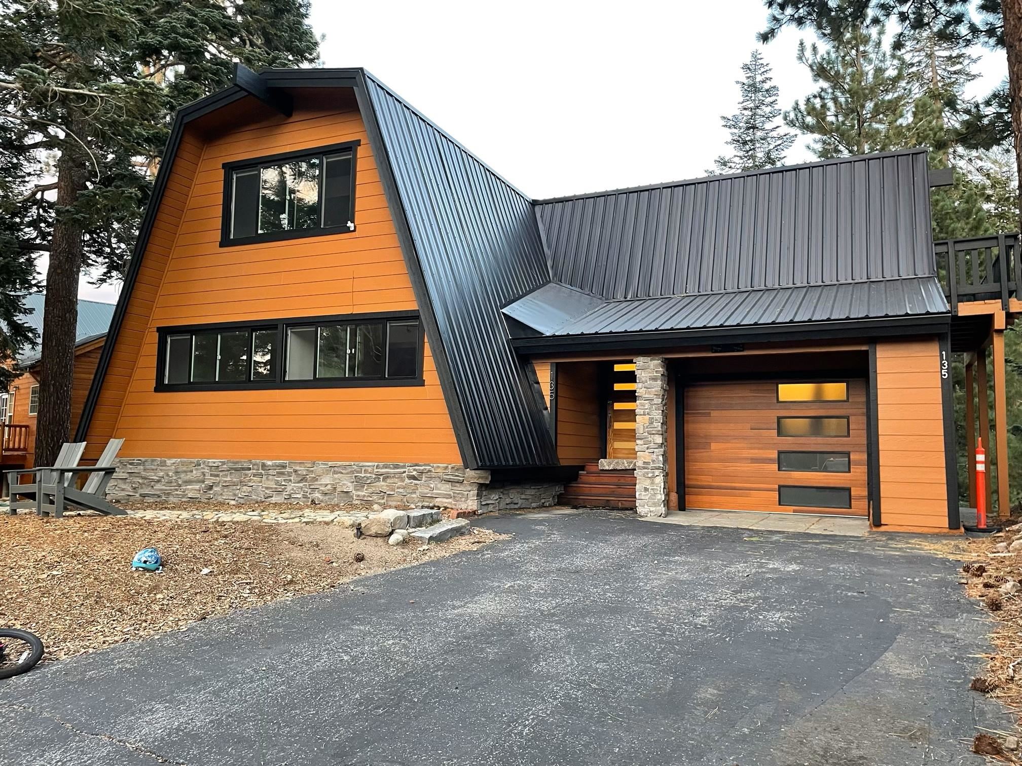 a view of a house with a garage and a garage