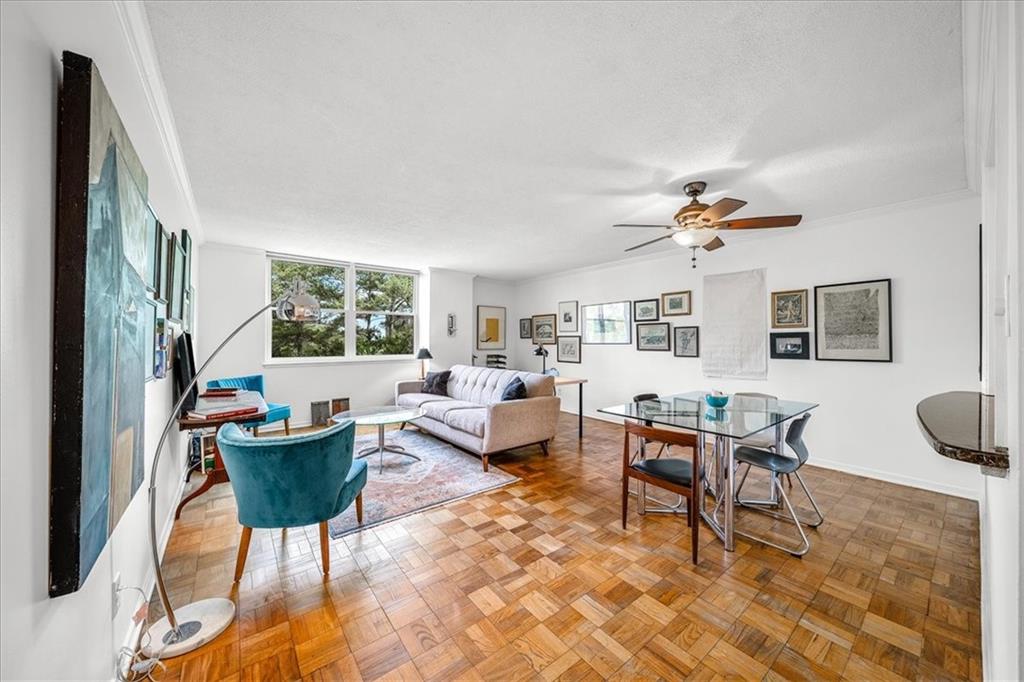 a living room with furniture and a window