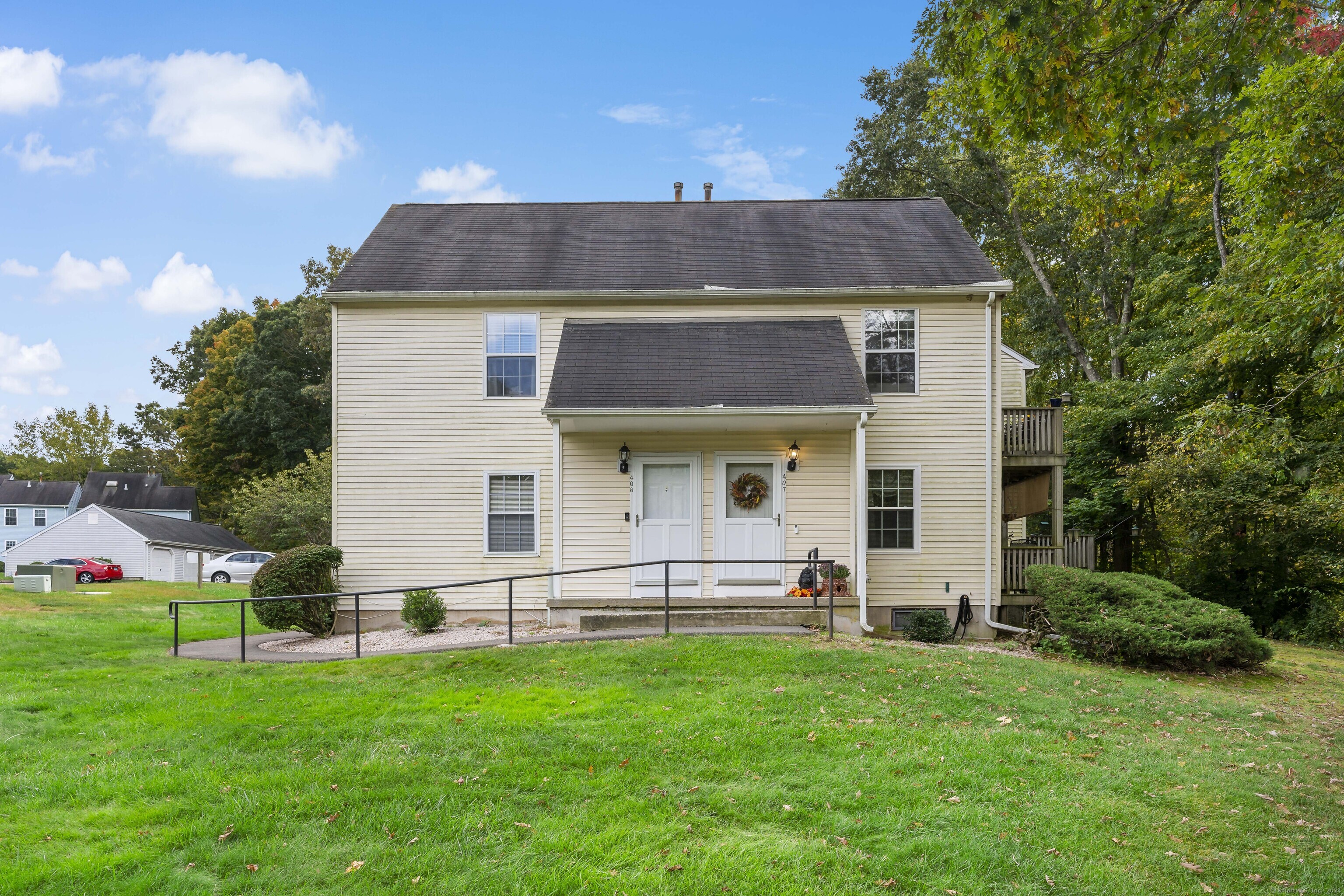 a view of an house with backyard space and garden