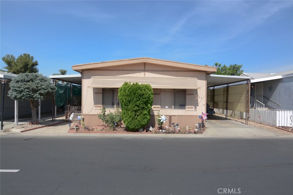 front view of a house with a small yard