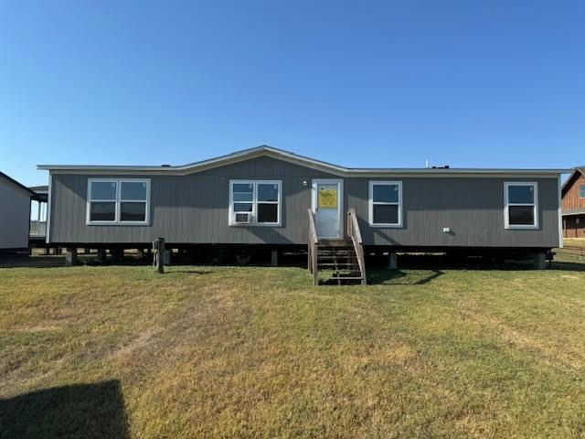 a house with yard in front of it