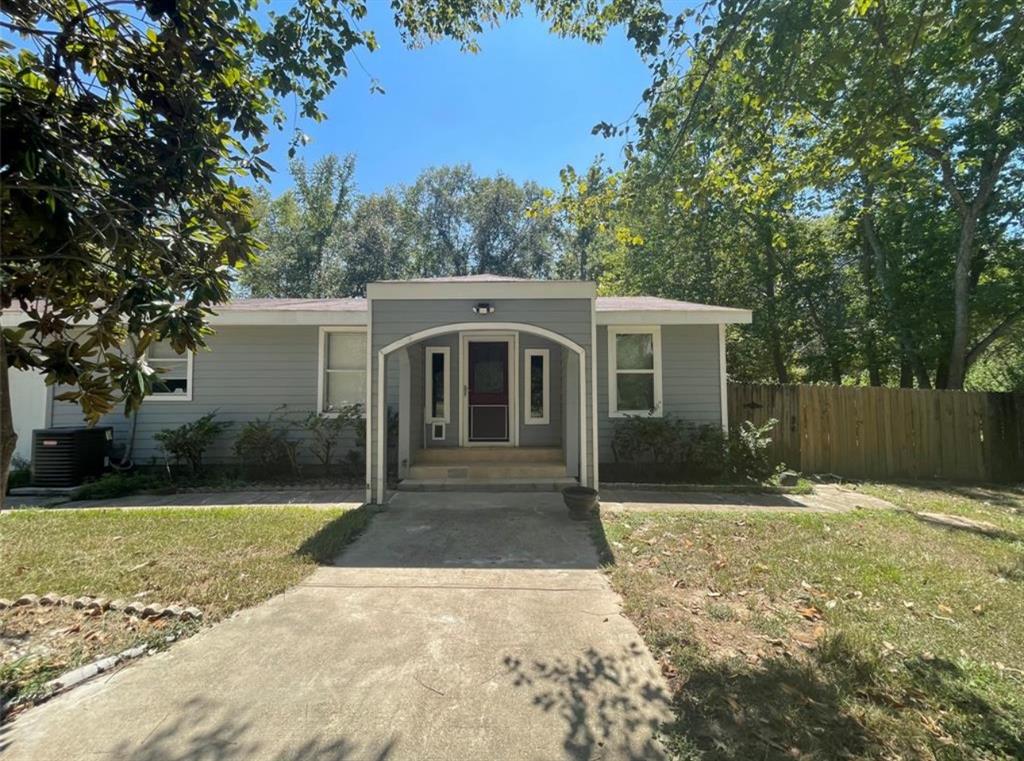 a front view of a house with yard