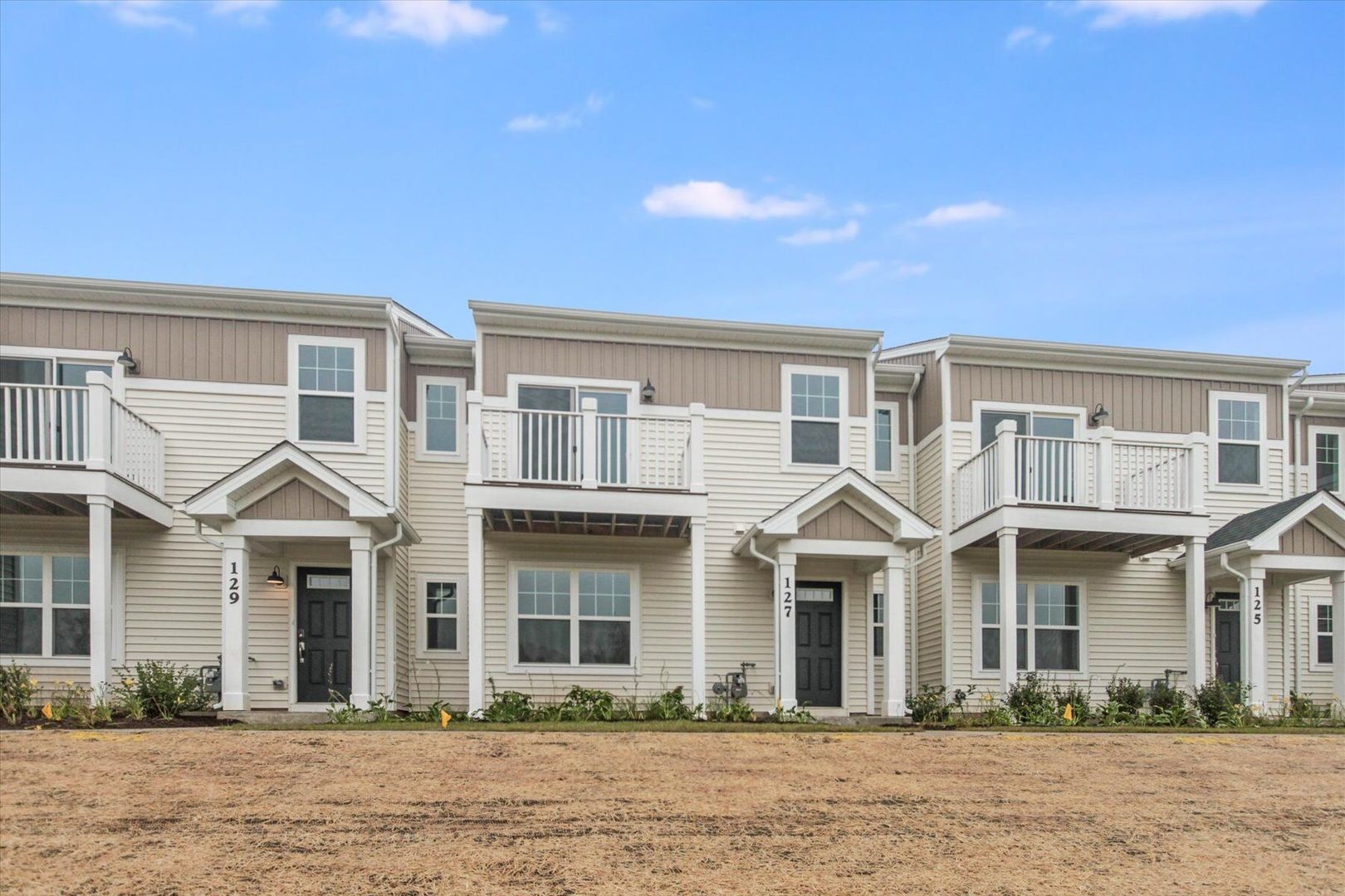 a front view of multiple houses