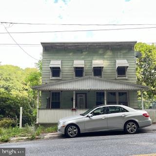 a car parked in front of a house