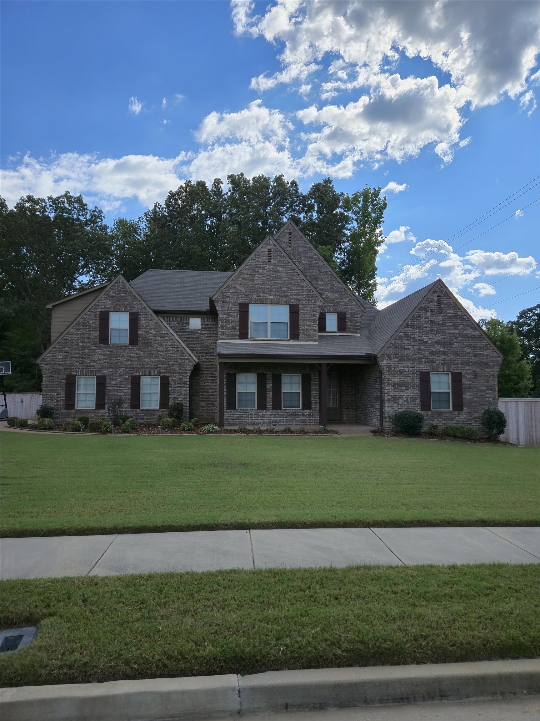 View of front of property with a front yard